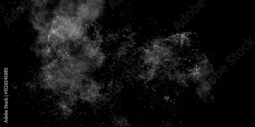 Gray dust Particle ink splash abstract design background. Dark background with white and gray smokey particle white dust is scattered by white cluster explosion on a black background.