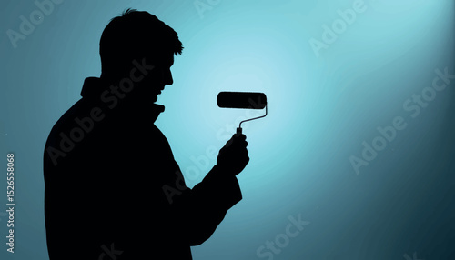 Silhouette of person using lint roller on coat, cleaning routine