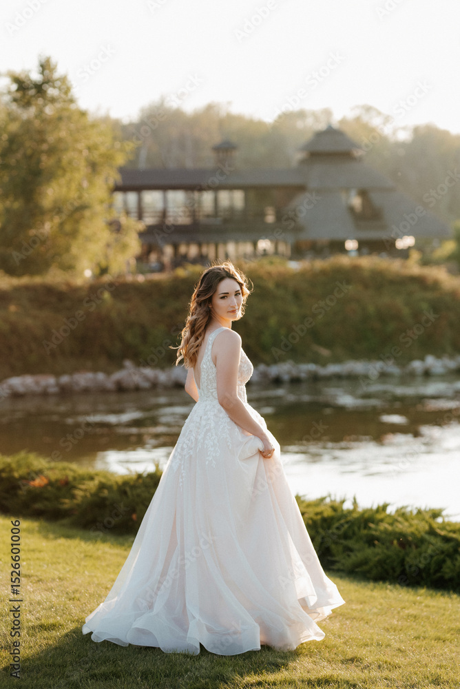 bride against the background of a yellow sunset bride against the background of a yellow sunset