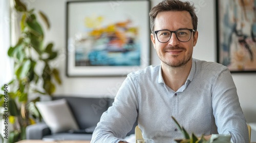 Portrait of a smiling man in a modern home