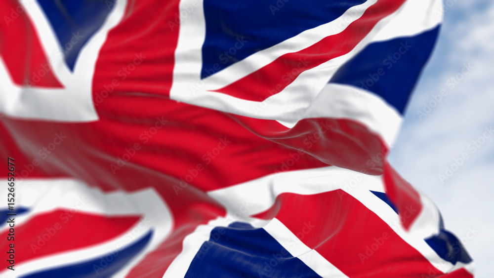 Fototapeta premium Close-up of national flag of the United Kingdom waving in the wind