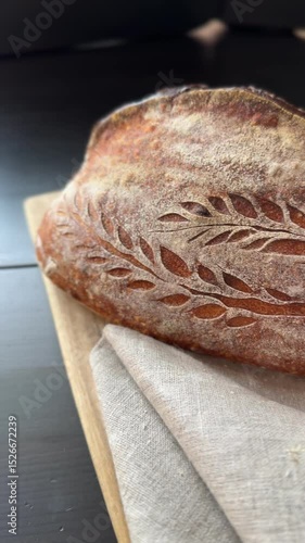 freshly baked sourdough bread with a textured, golden crust.