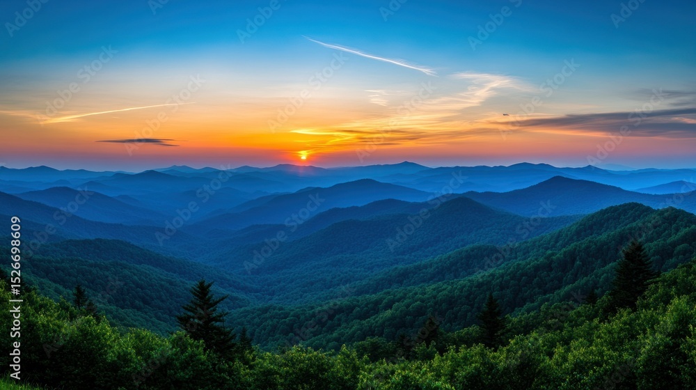 Obraz premium A beautiful sunset over a range of majestic mountains