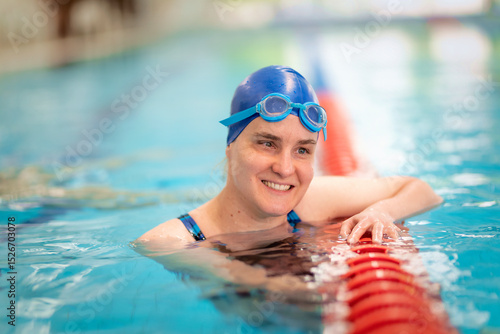 Wallpaper Mural A visually impaired woman in swimming pool after training Torontodigital.ca