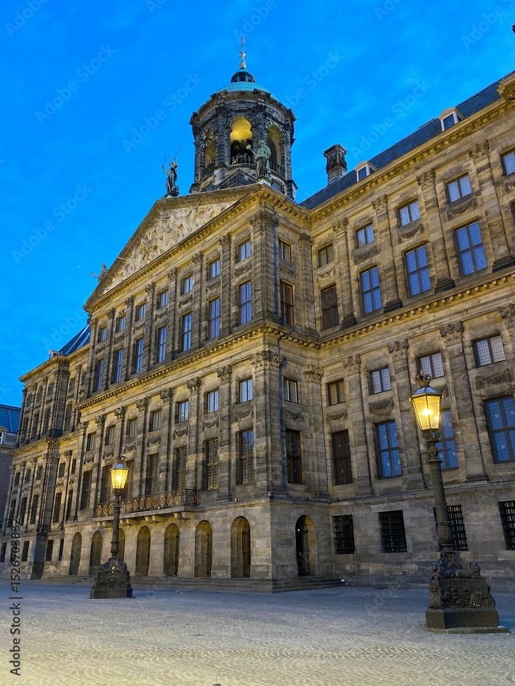 Fototapeta premium The Royal Palace of Amsterdam at dusk.