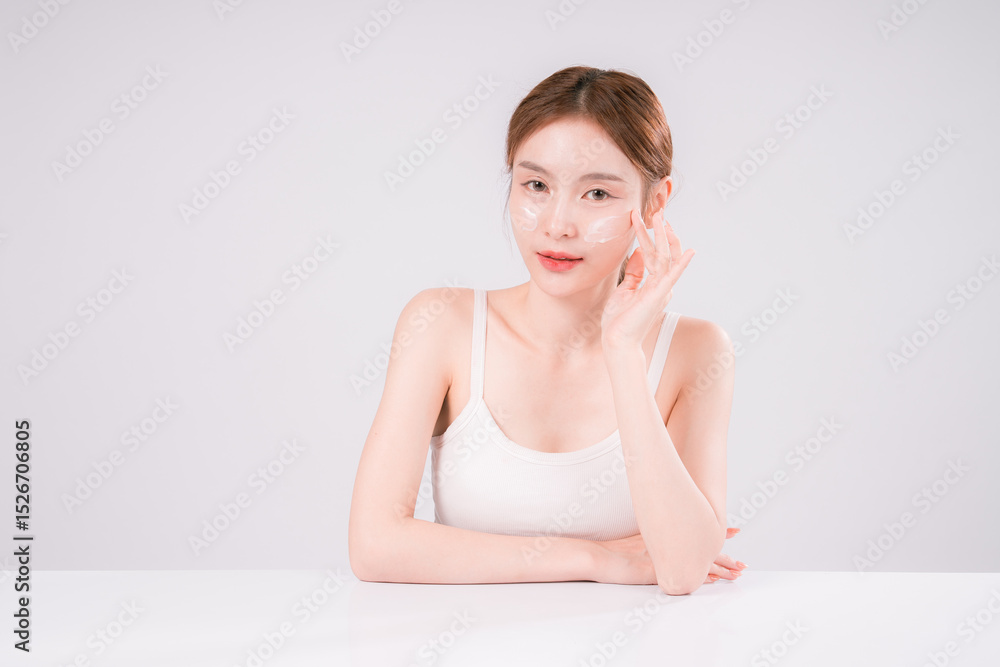 Fototapeta premium Skin Care Woman Asian Person Smile White Beauty Young Portrait Face Background, Confident and Radiant Female Model with Healthy Skin On White Background
