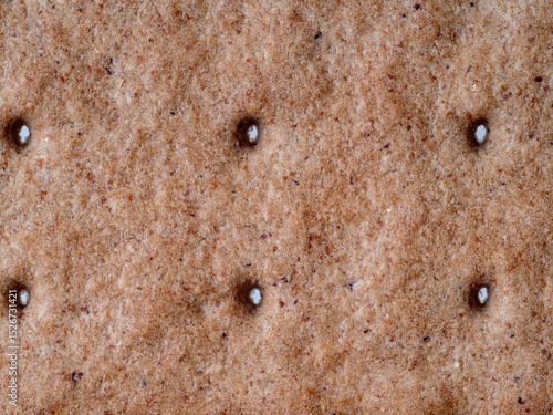The family is sitting at home on the mats