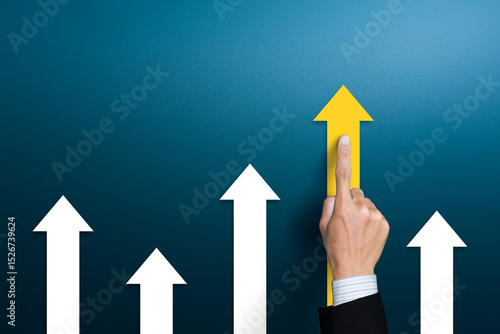 Businessman pushing arrow up, Business competition concept.