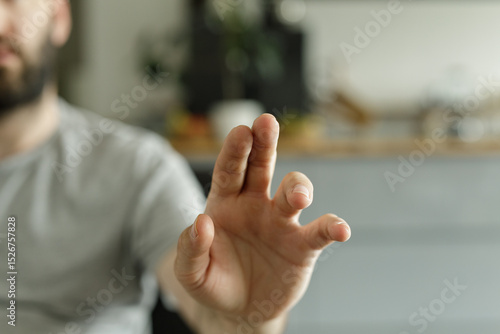 Close up of a man's hand re...
