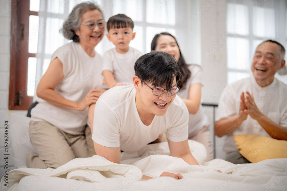 Family enjoying playful moments together in a cozy and bright indoor setting during a joyful gathering Family enjoying playful moments together in a cozy and bright indoor setting during a joyful gathering