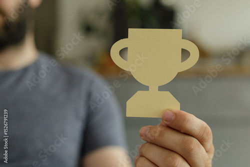 Close-up of a man holding a...