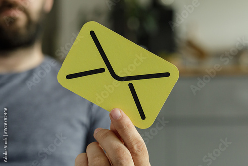 Close-up of a man holding a...