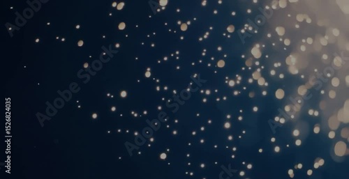 A seamless loop of abstract light particles moving gracefully through a dark, ethereal space. Soft, dreamy bokeh effect.
Ideal for background or overlay. 4K, slow motion, calming atmosphere.