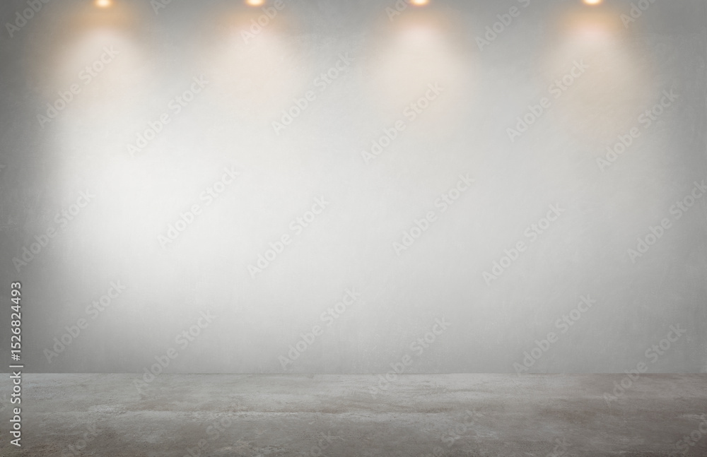 Gray wall with a row of spotlights in an empty room Gray wall with a row of spotlights in an empty room