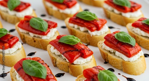 Wallpaper Mural Rows of baguette slices topped with ricotta, roasted red pepper, basil, and balsamic glaze, arranged on a white surface. Torontodigital.ca