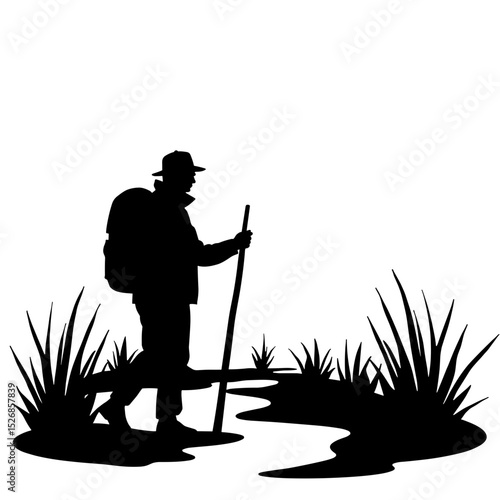 Explorer silhouette with walking stick on nature trail, adventure journey outdoors