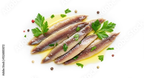 Fresh anchovies garnished with parsley and spices on a white plate, ideal for culinary presentations