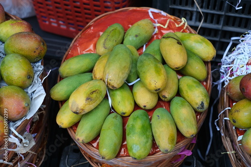 Fresh Ripe Mangoes at Market Display for sell 