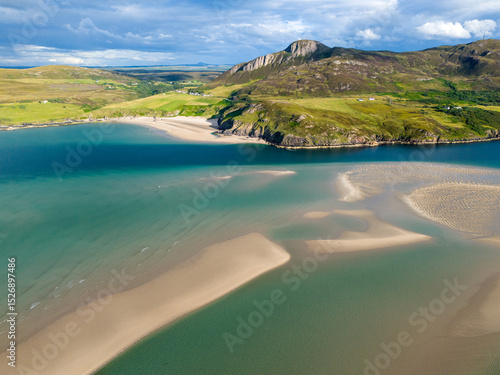 Aerial view of sand banks in a shallow bay with rocky coastline, Kyle of Tongue, Scotland