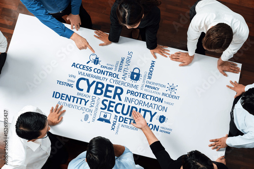 Tableau sur toile A diverse team engages in a cybersecurity strategy meeting, analyzing crucial terms and concepts related to modern digital security threats and effective protection measures