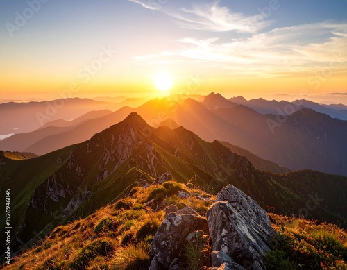 Majestic Mountain Range at Sunrise with Golden Light