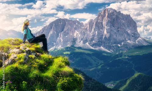 Sitting girl on the top wit...