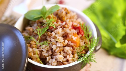 simple dinner with buckwheat and vegetables in a ceramic bowl