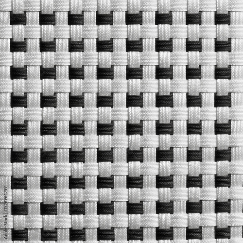 Close-up image of a woven textile pattern, showing a detailed crisscross weave structure. Ideal for backgrounds, design textures, or textile-related mockups. Created with Generative AI technology.