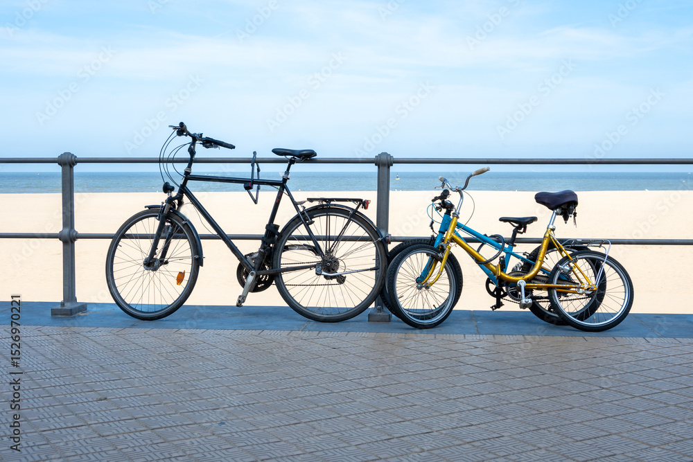 Fototapeta premium Bike lying on sandy beach summer weather. Summer sport, travel concept.
