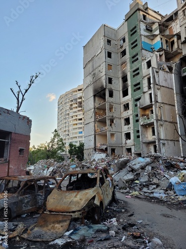 Принти на полотні Devastated buildings and burned cars in a war-torn Chernihiv, Ukraine