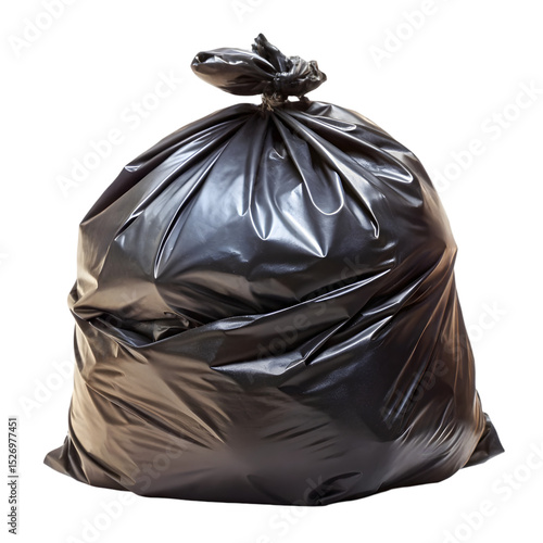Full and sealed black garbage bag isolated against a dark background for versatile use