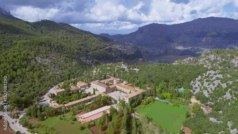 Aerial View of Mountainous Landscape with Building Complex Aerial View of Mountainous Landscape with Building Complex