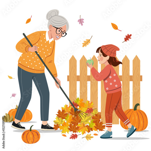 An elderly woman and a girl are gathering fallen autumn leaves. The woman is raking the leaves into a pile, while the girl holds a green apple. In the background, there is a wooden fence.