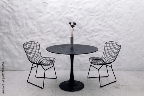 A table and chairs for the kitchen in a modern interior minimalism