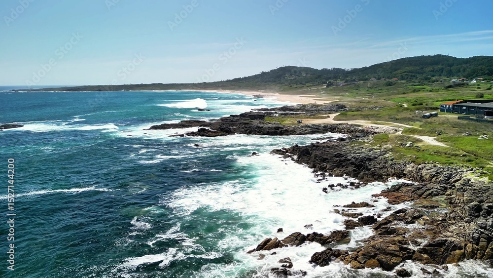 A breathtakingly beautiful coastal landscape showcasing dynamic waves and rugged rocky shores A breathtakingly beautiful coastal landscape showcasing dynamic waves and rugged rocky shores