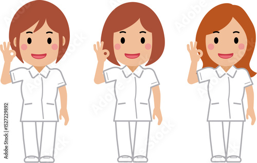 笑顔でOKサイン。白い制服の女性看護師