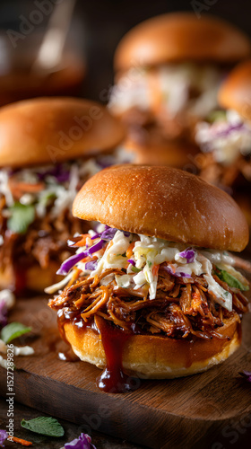 Close Up Of Delicious Pulled Pork Sliders With Coleslaw On Wooden Board Showing Detailed Texture And Shallow Depth Of Field