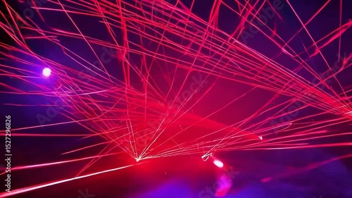 Vibrant Red Laser Light Display Creating Dynamic Patterns in Dark Background for Artistic Visual Effects
