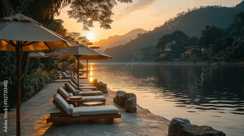 Fototapeta Naklejka Na Ścianę i Meble -  Tranquil riverside sunset getaway