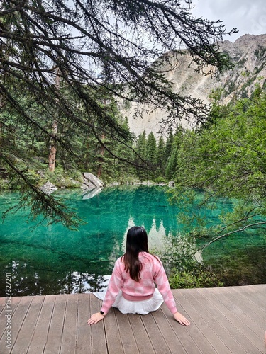 woman sitting on a rock