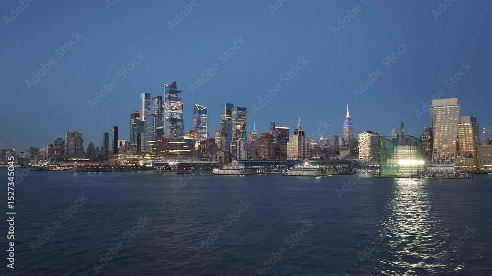 Aerial view of Midtown Manhattan and The Hudson River at night Aerial view of Midtown Manhattan and The Hudson River at night