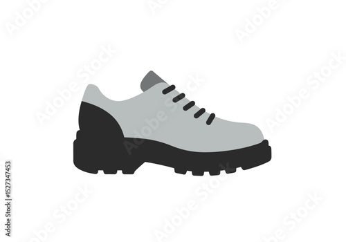 A grey shoe with a thick black sole sits on a white background It has black laces and a black heel