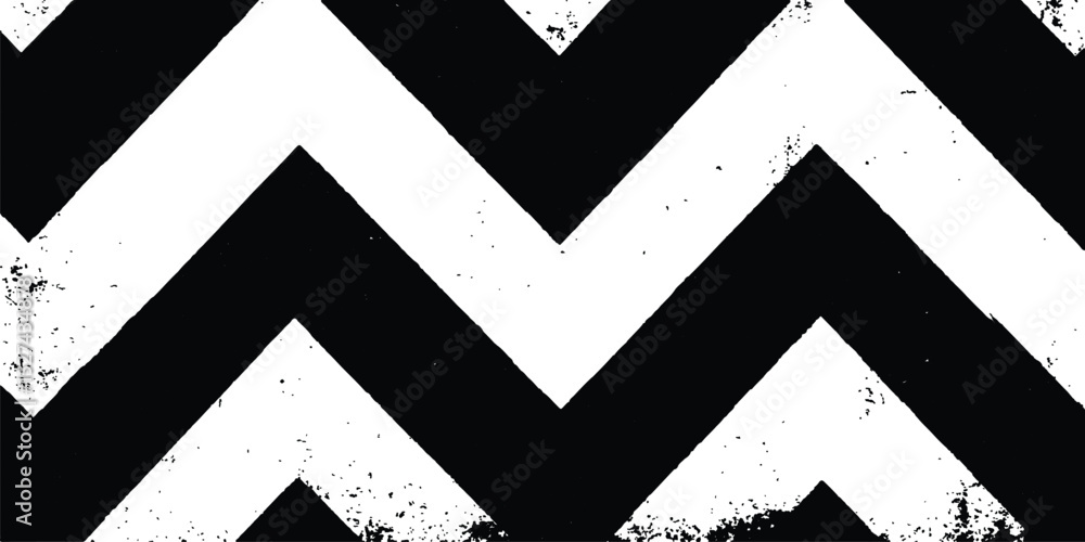 Fototapeta premium A black and white chevron patterned background. Black and white chevron pattern texture background. Dynamic monochromatic zigzag pattern isolated on white background.