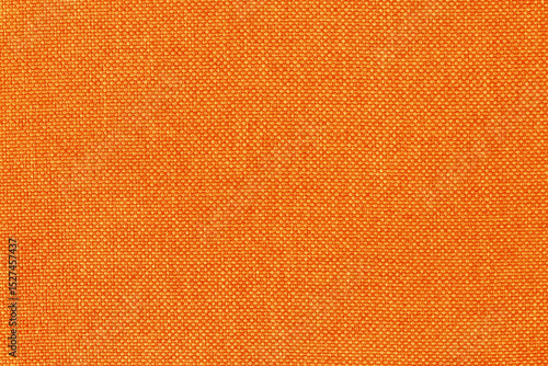 Orange fabric cloth texture for background, natural textile pattern.