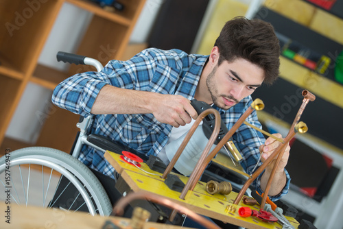 male handicapped conductor assembler