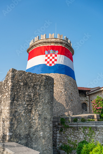 Fotografie Croatian national flag on the Historic circular tower in Trsat castle, Rijeka