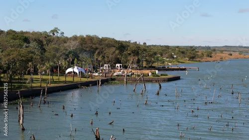 Wallpaper Mural Dead trees in the Parana River near picnic area on the shore, Nemesio Parma, Argentina Torontodigital.ca