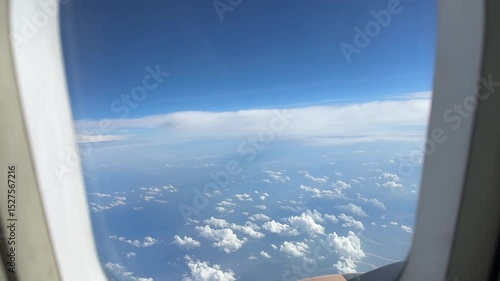 see the beauty of the sky clouds from the airplane window