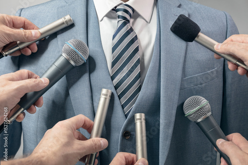 Tableau sur toile Interview with microphone politician or leader making an announcement or stateme