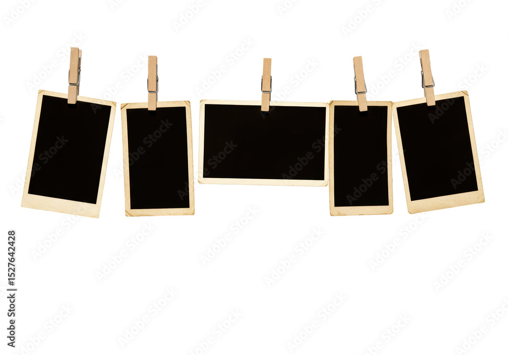 Isolated Collection of Blank Instant Photo Frames Hanging from Clothespins Isolated Collection of Blank Instant Photo Frames Hanging from Clothespins